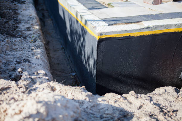 Professional Waterproofing technician working in Harrison, WI